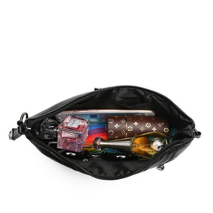 Women's spacious PU leather clutch bag for everyday use, fashion accessory, worn crossbody style