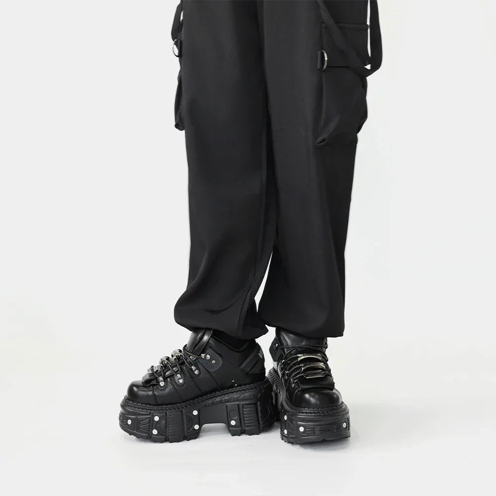 Alternative women's chunky platform shoes with unique nail-studded soles, designed for a bold rebel look.