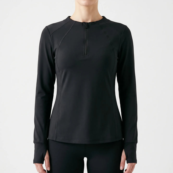 Athletic women's quarter-zip top, sleek fit, perfect long sleeve workout gear for active women and fitness.
