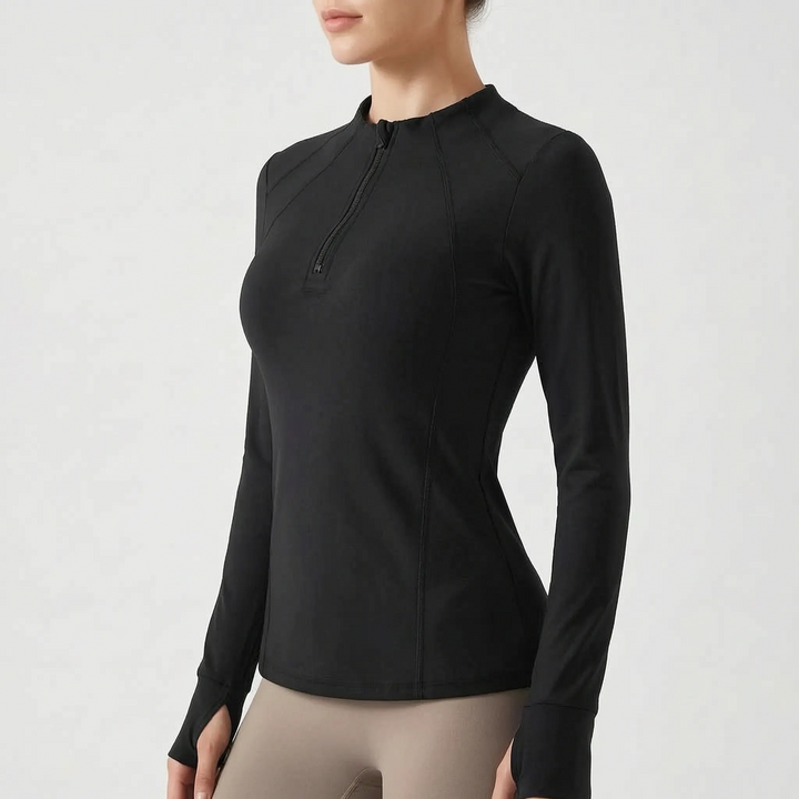 Versatile women's quarter-zip sports top, a perfect active layer long sleeve for layering during cool weather workouts.