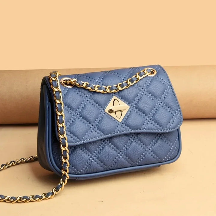 Genuine leather women's crossbody bag with elegant quilting, a stylish and practical purse.