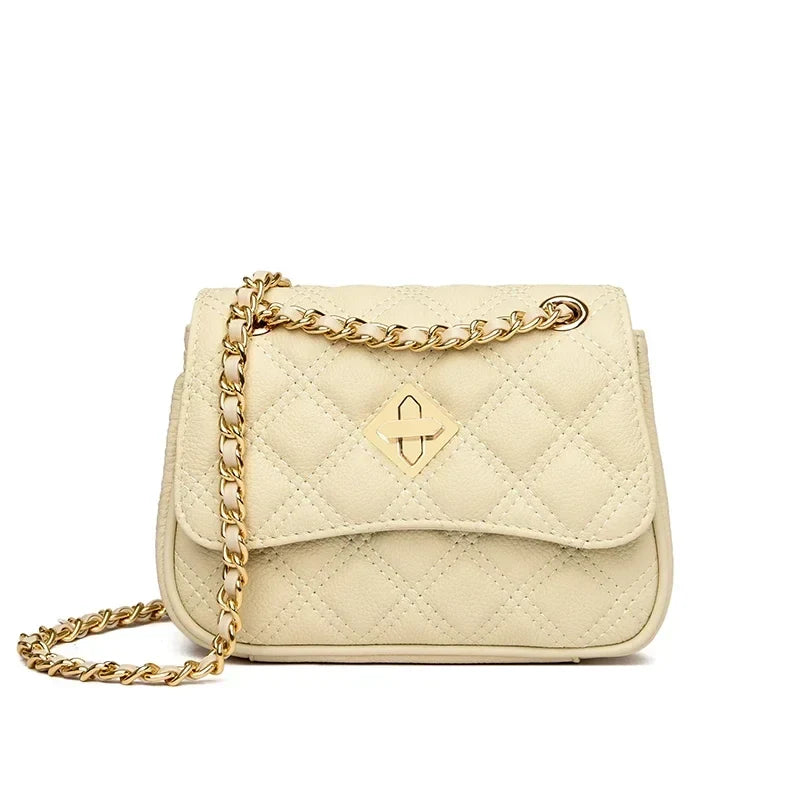 Black quilted leather crossbody purse, perfect for women seeking a chic and compact shoulder bag.