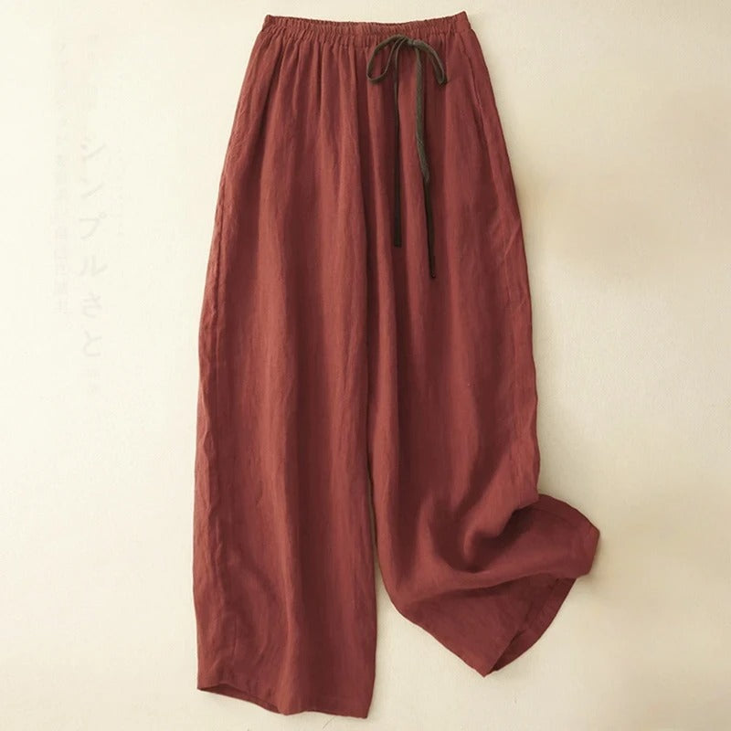 Comfortable women's red flowy wide-leg pants, perfect for relaxed casual wear and effortless summer fashion.