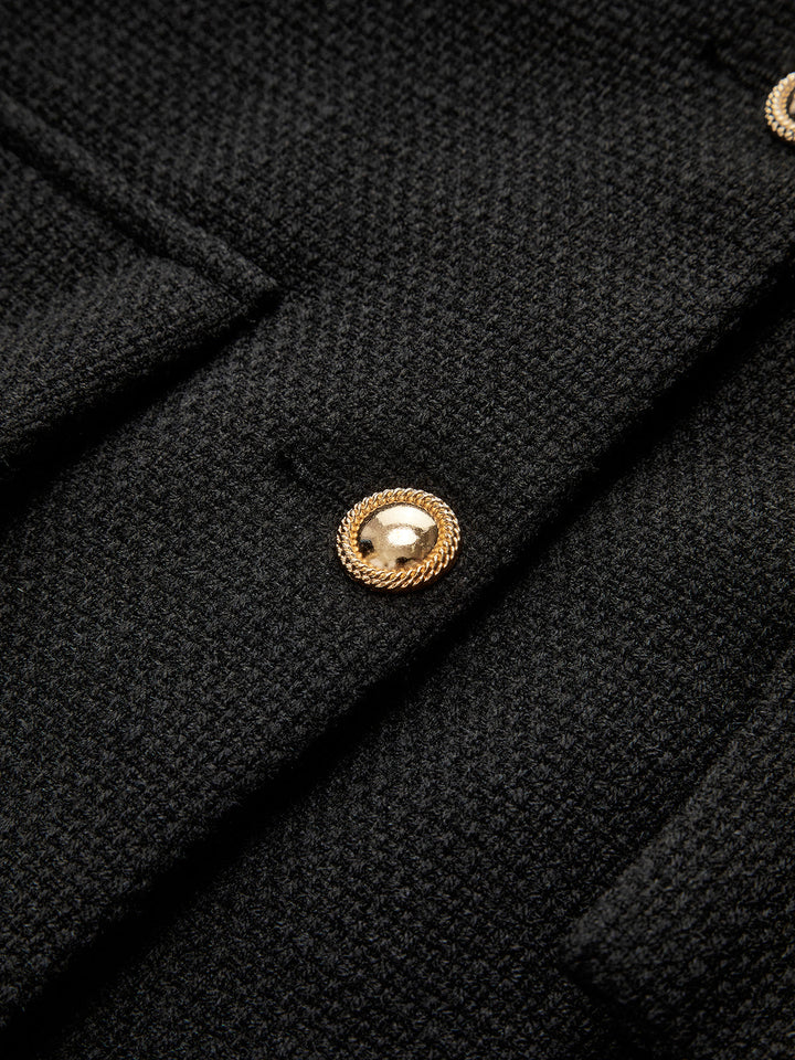 Elegant women's black blazer, featuring stylish gold buttons. Ideal for professional wear, business attire, or formal occasions.