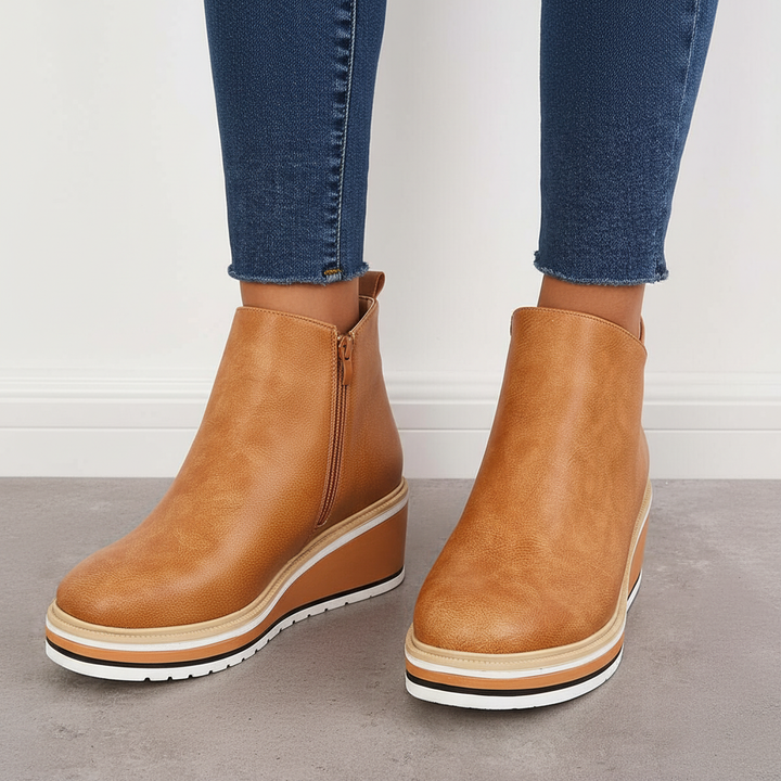 Comfortable women's vegan leather ankle boots with platform, versatile for casual and trendy winter footwear