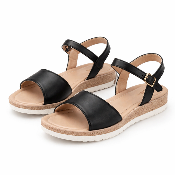 Close-up of women's black platform wedge sandals with adjustable ankle strap, ideal for summer footwear.