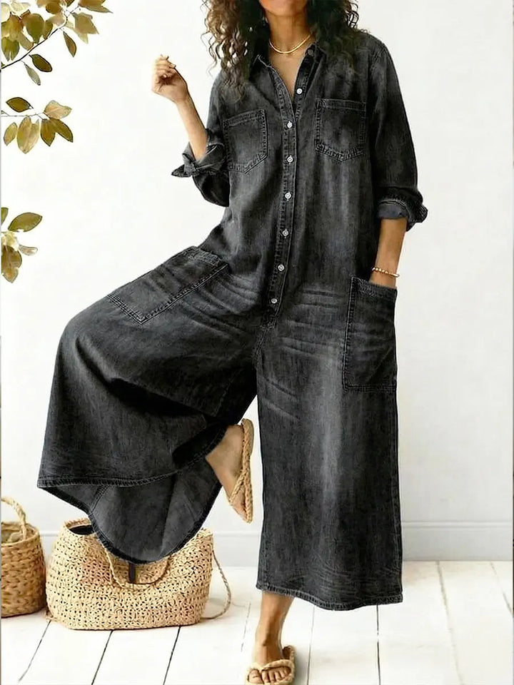 Comfortable women's wide leg button-up jumpsuit in utility style. Long sleeve, relaxed fit for everyday casual wear.