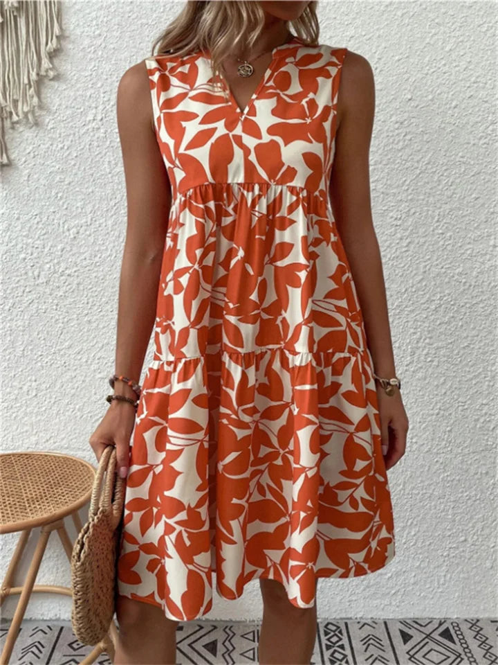 Vibrant floral print flowy summer maxi dress for women, with a comfortable v-neck. Effortless elegance & style.