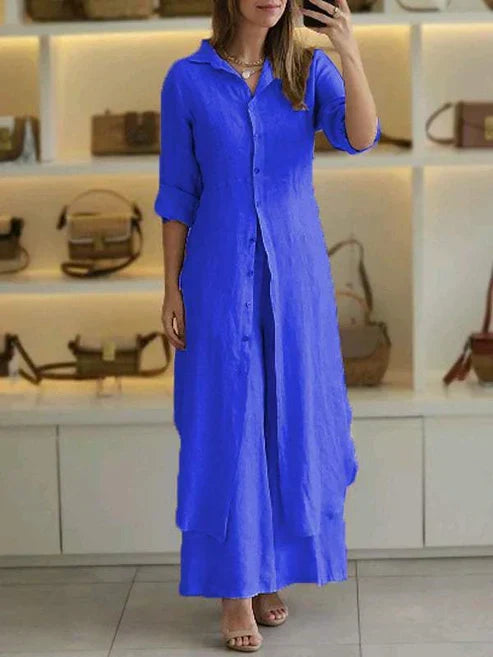 Women's blue button-down maxi shirt dress with 3/4 sleeves, perfect for casual summer wear.