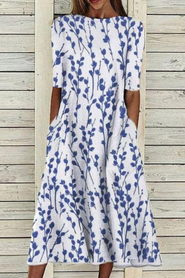 Women's blue floral half sleeve midi dress with a crew neck, perfect for comfortable, versatile casual spring/summer wear.