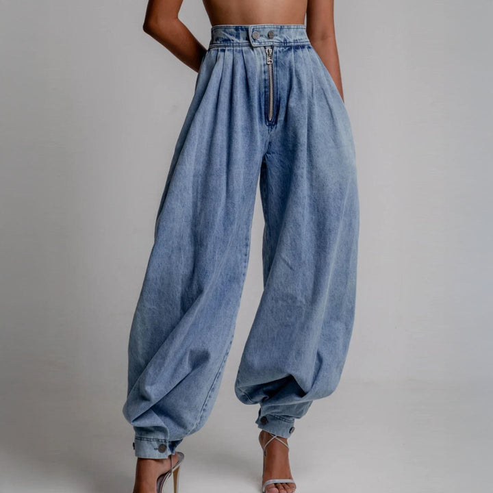 Women's blue high-waist balloon-leg trousers. Stylish, relaxed fit pants perfect for casual fashion & everyday wear.