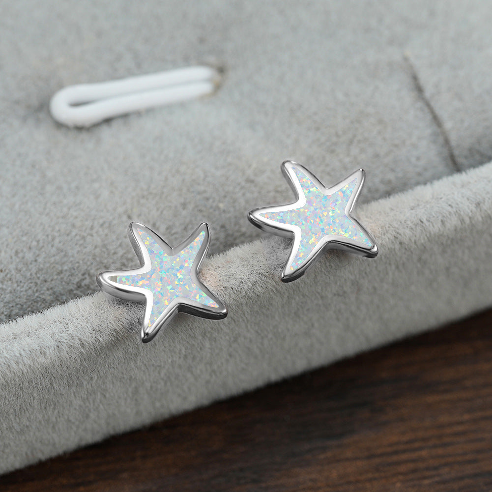 Delicate blue opal starfish earrings, women's jewelry, perfect for ocean lovers.