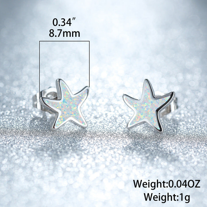Women's silver blue opal starfish earrings, capturing the beauty of the sea.