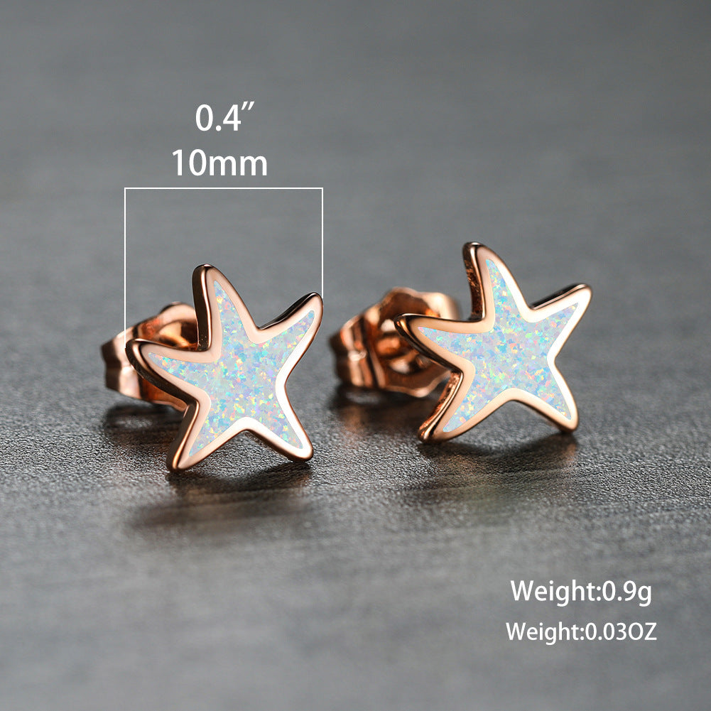 Women's blue opal starfish earrings, perfect for adding an ocean touch to your look.