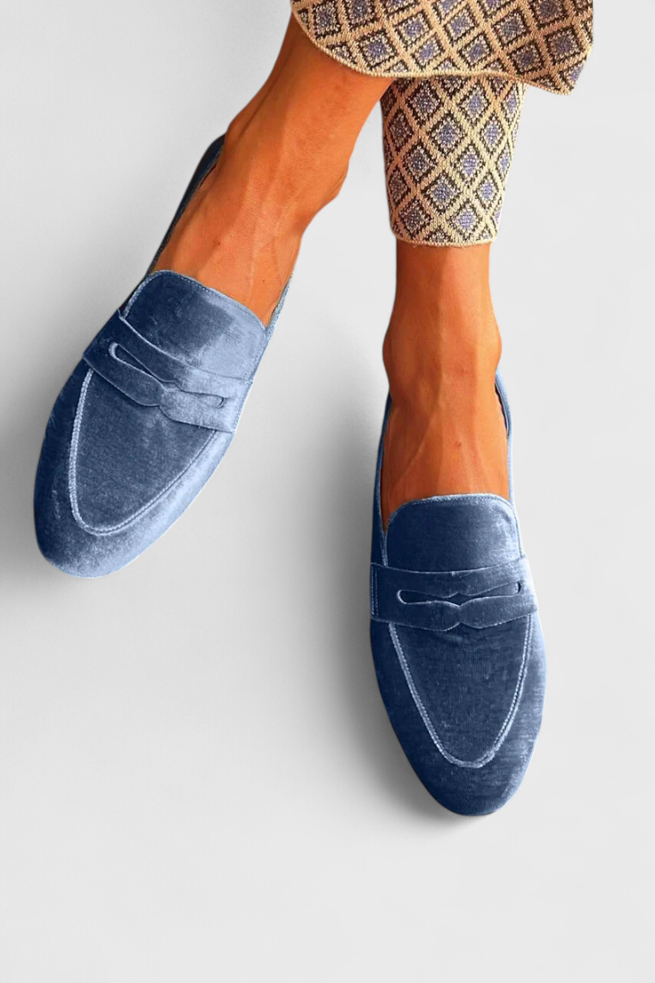 Elegant women's blue slip-on loafers. Comfortable flat shoes for office, everyday wear & walking.