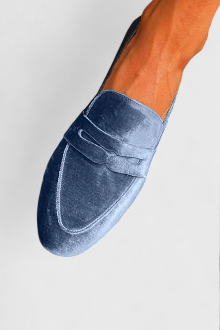 Classic blue women's loafers. Slip-on design provides comfort & style for versatile everyday fashion.