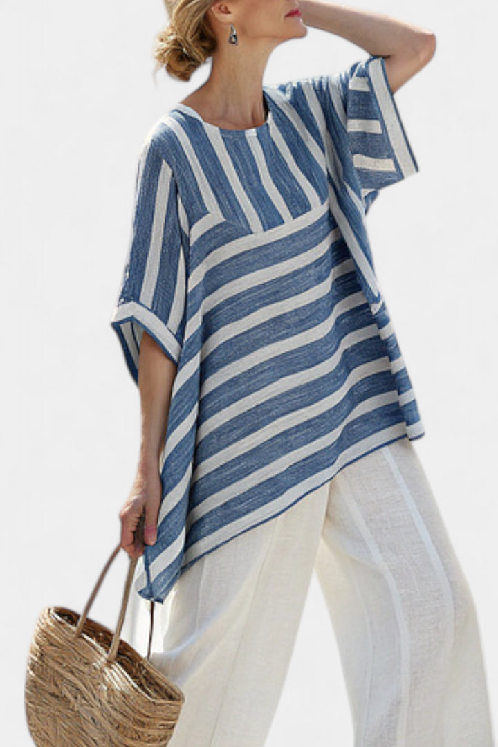 Stylish women's blue striped set featuring a relaxed fit batwing top with an asymmetric hem & wide leg pants.
