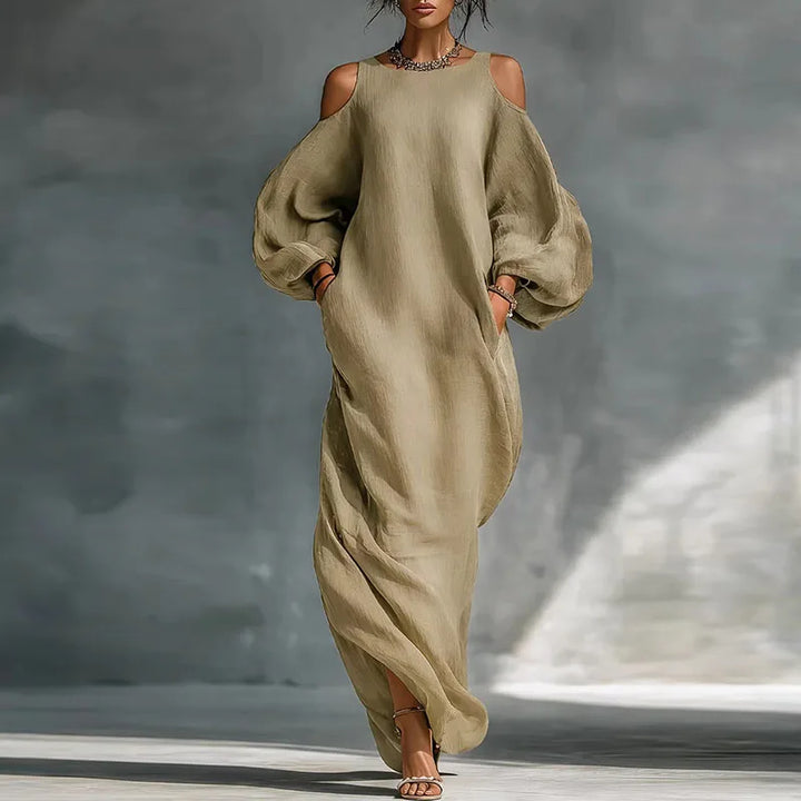 Elegant women's flowing bohemian maxi dress with cold shoulder design for relaxed everyday comfort & spring fashion.