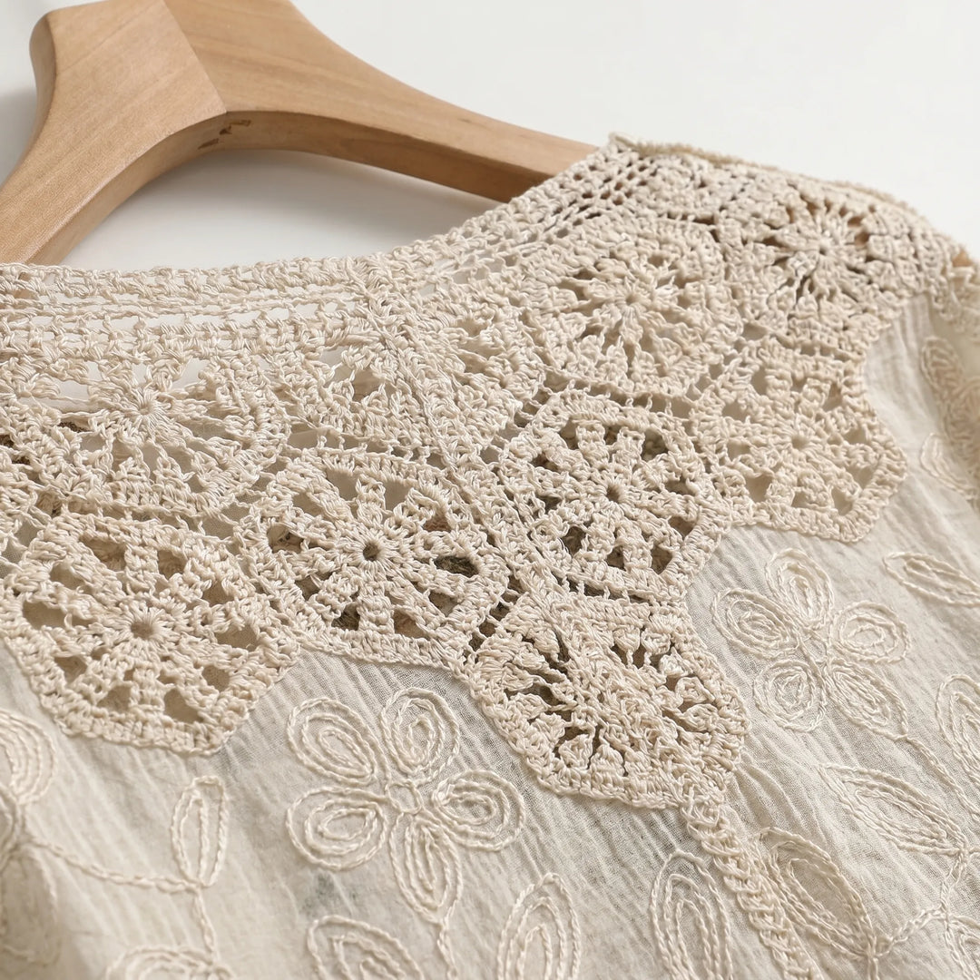 Stylish women's cream bohemian cardigan. Lightweight and open front, great for relaxed summer outfits.
