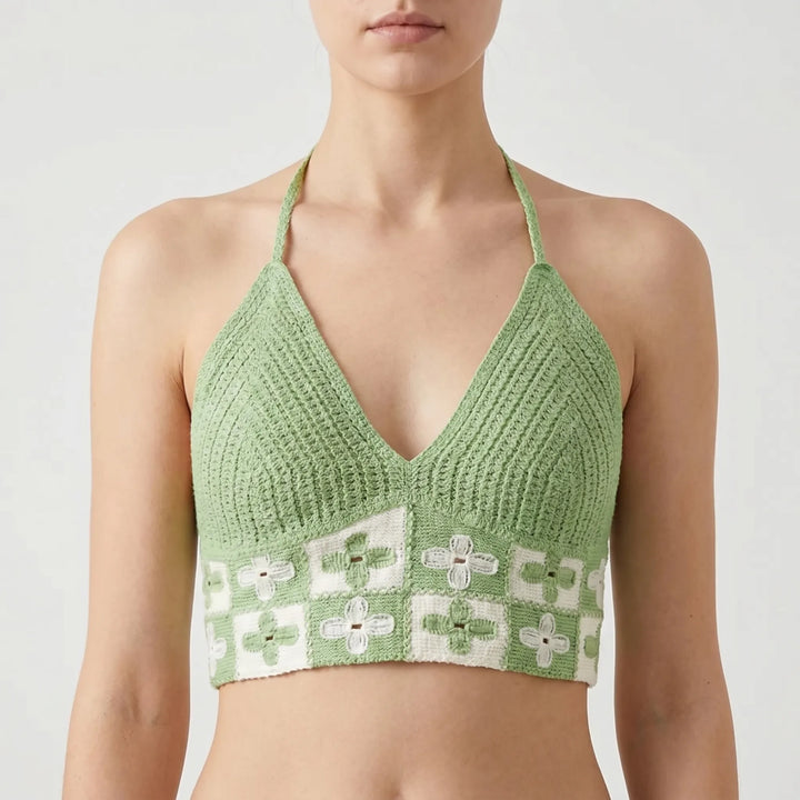 Fashionable women's bohemian crochet crop top. Halter design, ideal for summer beachwear.