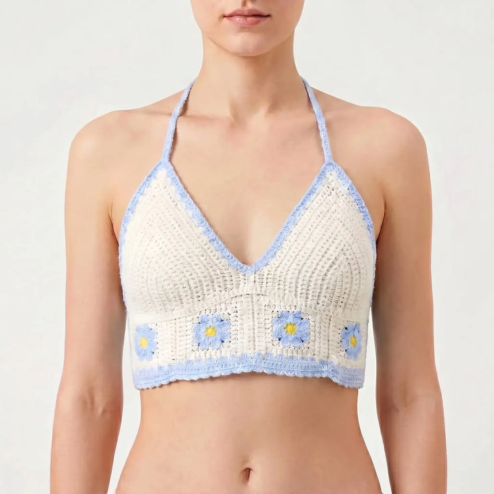 Summer-ready women's crochet halter crop top. Bohemian style, perfect for festivals.