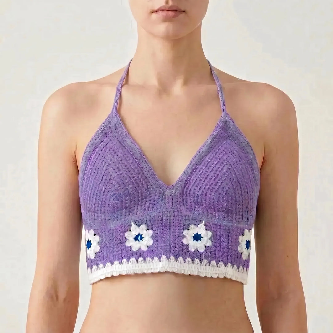 Elegant women's crochet crop top, bohemian halter style, perfect for summer outfits.
