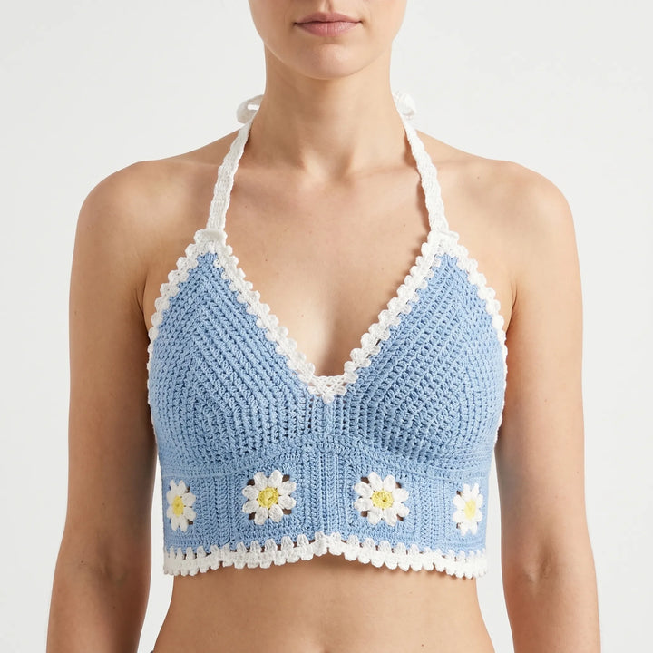 Stylish women's crochet halter crop top with intricate bohemian design. Ideal for summer.