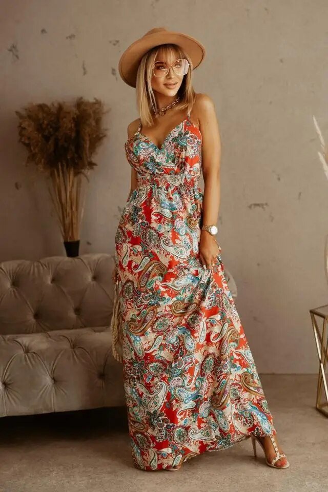 Women's summer resort wear, a flowy floral maxi dress perfect for beach vacation