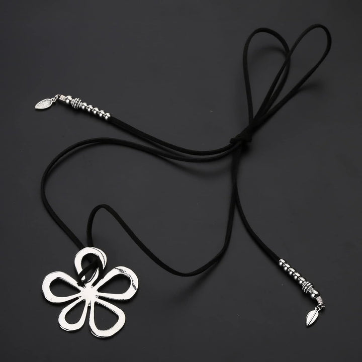 Statement women's necklace, bohemian floral pendant. Ethnic style stainless steel jewelry.
