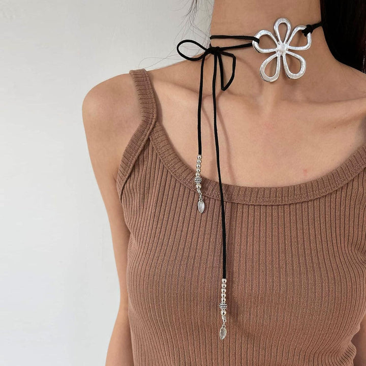 Stylish women's ethnic floral pendant necklace. Bohemian fashion accessory, great gift.