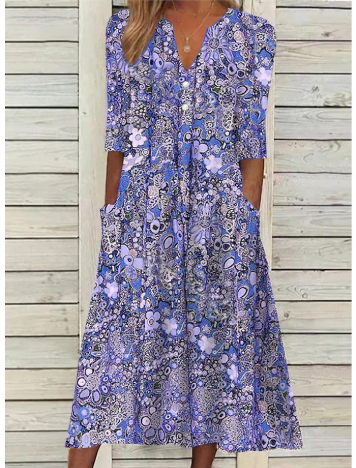 Elegant Women's floral V-neck midi dress with half sleeves. Bohemian style, ideal for spring fashion & travel.