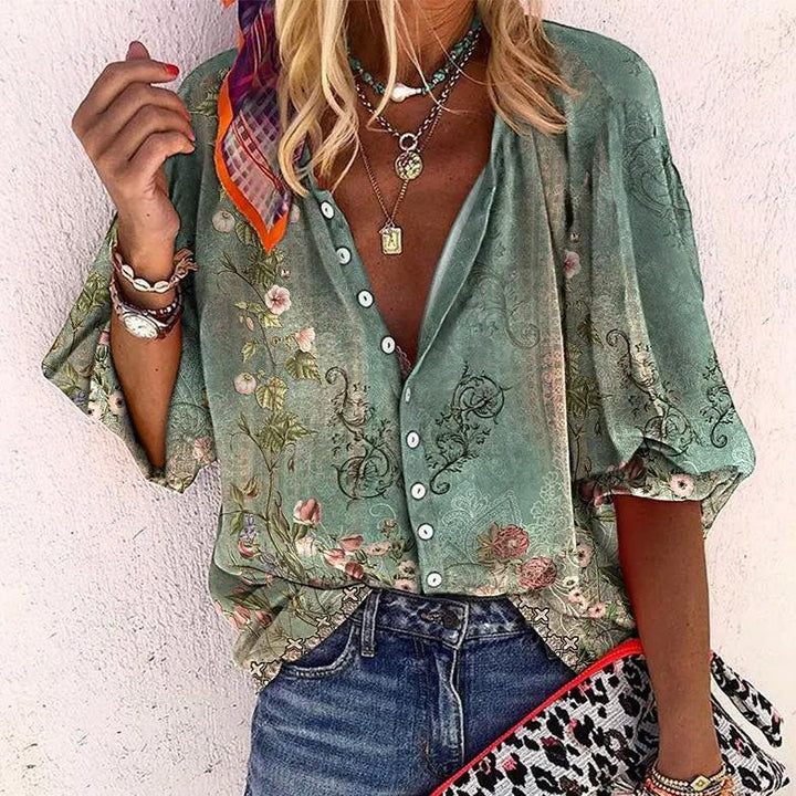 Women's bohemian floral V-neck blouse with short sleeves and button front. Perfect for summer casual wear.