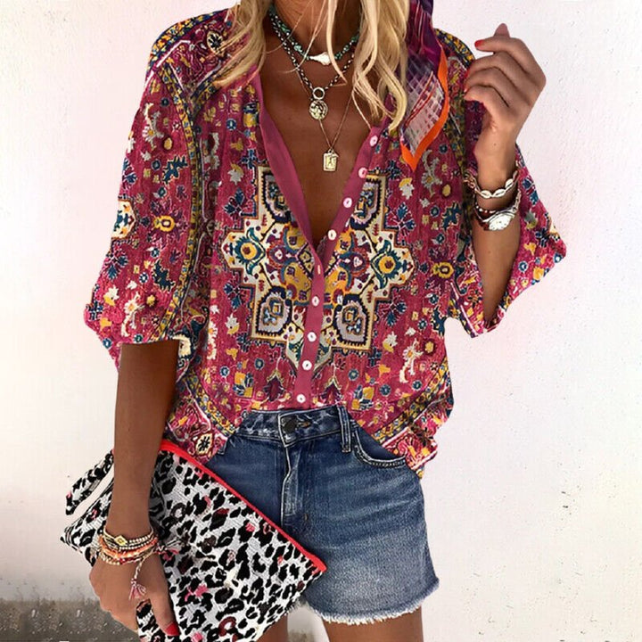 Bohemian women's button-front floral top, featuring short sleeves and a comfortable, relaxed fit.