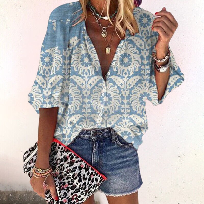 Chic women's floral short sleeve V-neck blouse with delicate button-front detail, embodying bohemian style.