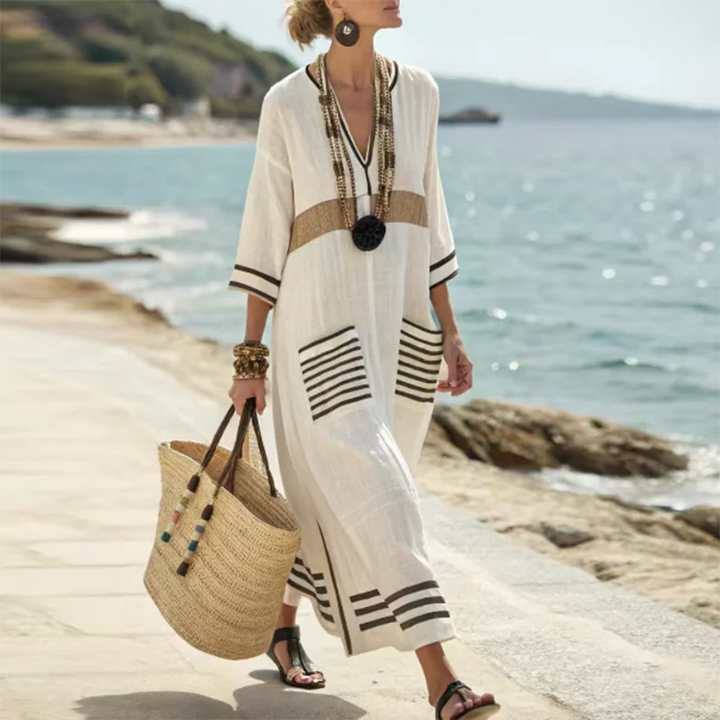 Stylish women's bohemian flowy maxi dress with pockets, designed for beach, resort, or casual summer wear.