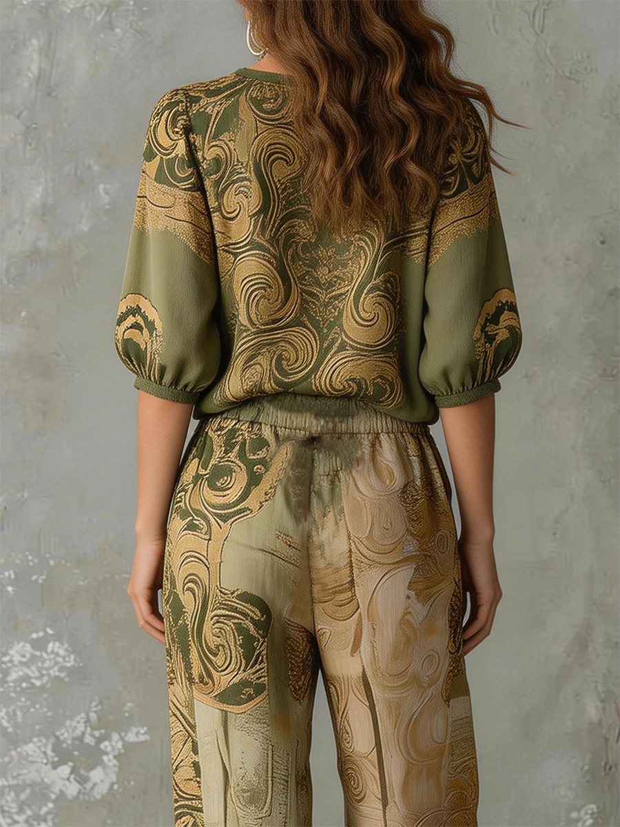 Comfortable women's bohemian two-piece set for everyday wear. V-neck top & relaxed pants in a vibrant print.