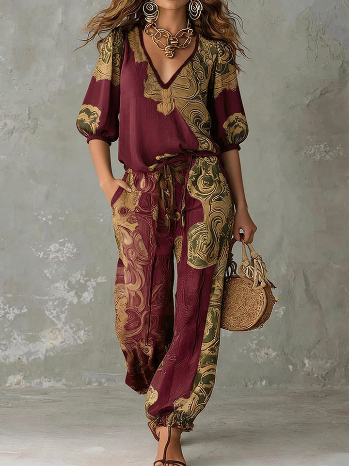 Trendy bohemian print two-piece set for women. Features a flattering v-neck top & comfortable, flowy pants.