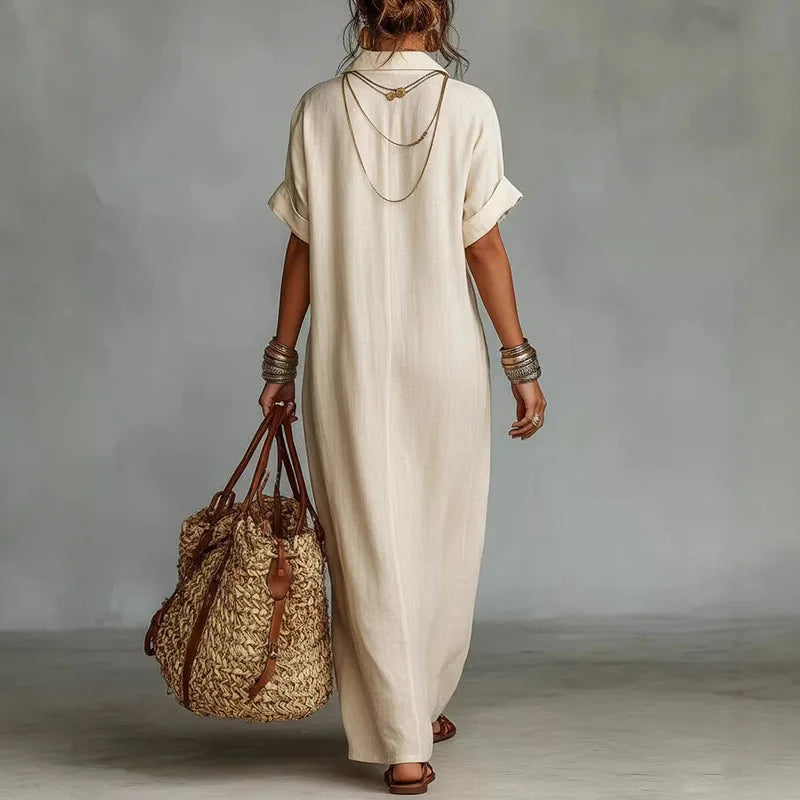 Flowy Bohemian printed maxi dress for women, featuring a stylish deep V-neck and vibrant patterns.