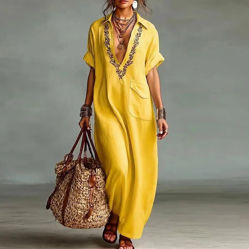 Elegant women's summer maxi dress with a bohemian print & deep V-neck. Ideal for beach days & resort wear.