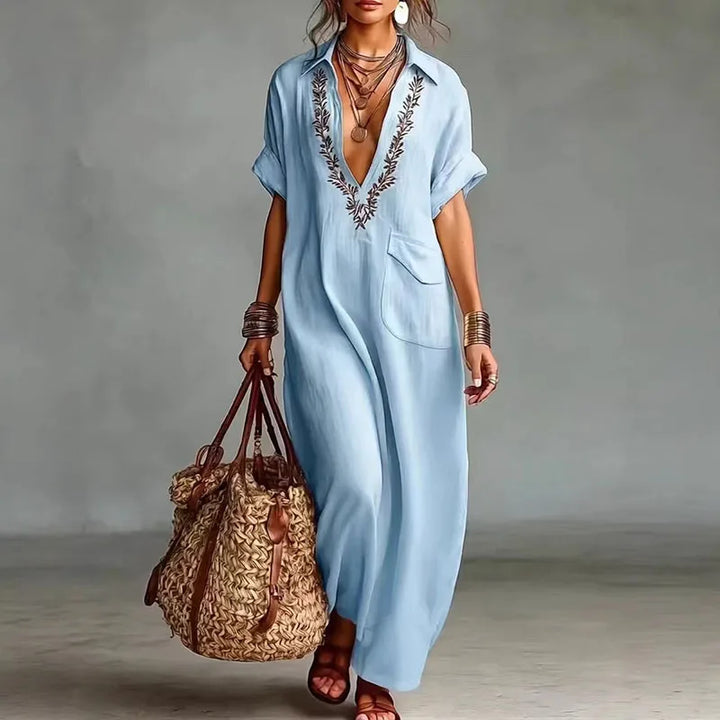Chic women's bohemian maxi dress, showcasing a beautiful print and deep V-neck, suitable for any occasion.