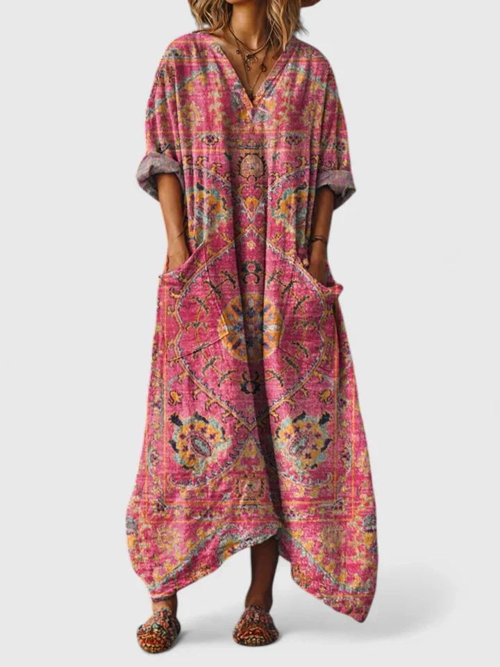 Loose fit women's bohemian printed wide-leg jumpsuit. Flattering v-neck, stylish one-piece for summer fashion.