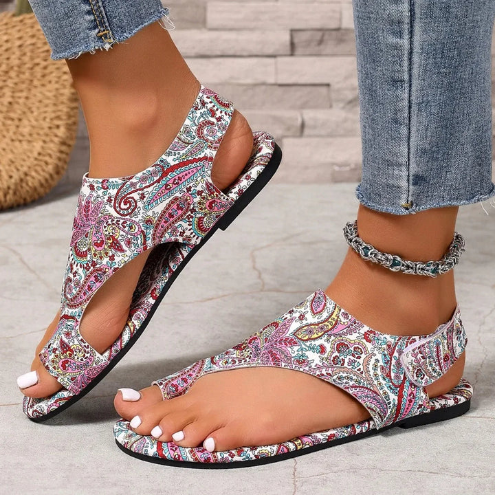 Women's Bohemian slingback flats on foot, showcasing stylish printed design, comfort, and open-toe for casual wear.