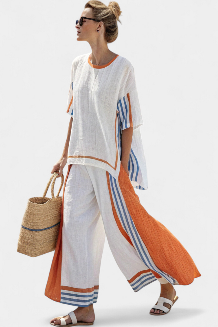 Women's bohemian striped two-piece lounge set. Comfortable oversized resort wear with wide-leg pants.