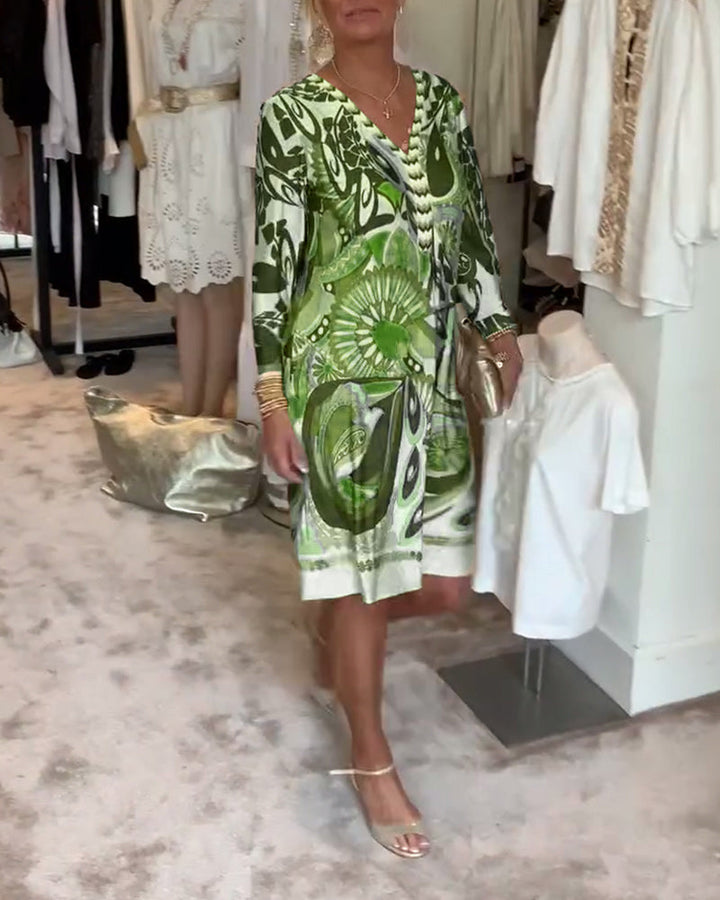 Stylish women's summer tunic dress with a unique Bohemian sunburst print, offering a casual flowy fit.
