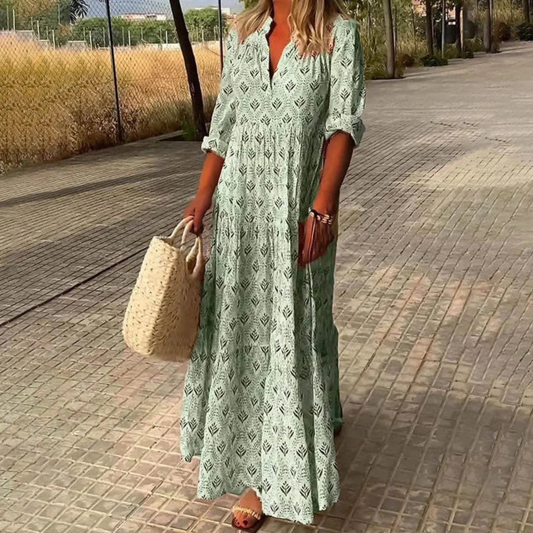 Flowing women's V-neck maxi dress in a long sleeve bohemian style. Versatile for beachwear, vacation, or spring.