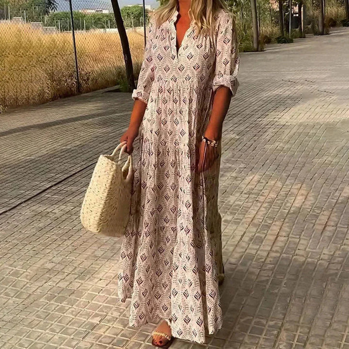 Relaxed fit women's bohemian V-neck maxi dress with long sleeves. Effortless style, perfect for summer & travel.