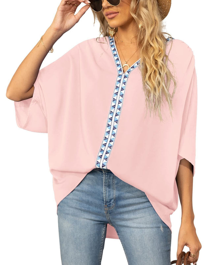 Women's bohemian V-neck tunic top with geometric print, perfect for casual spring wear.