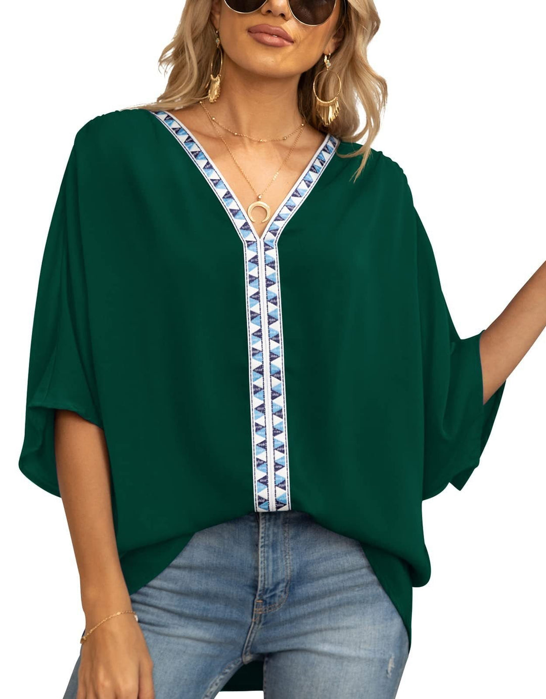 Chic women's V-neck bohemian blouse, relaxed fit, embroidered details, great for spring fashion.