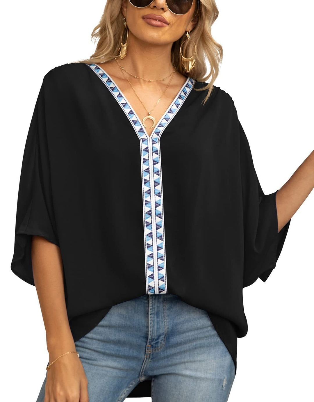 Flowy women's bohemian V-neck tunic with half sleeves, featuring a charming geometric print.