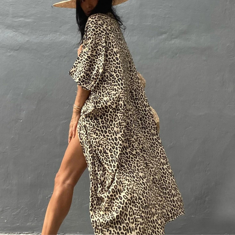 Stylish women's kimono sleeve blouse, a versatile boho beach coverup for summer fashion & relaxed wear.